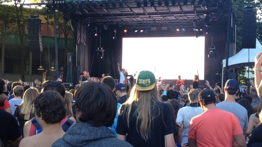 Image: The crowd cheers at the 2013 Bumbershoot Arts & Music Festival in Seattle....