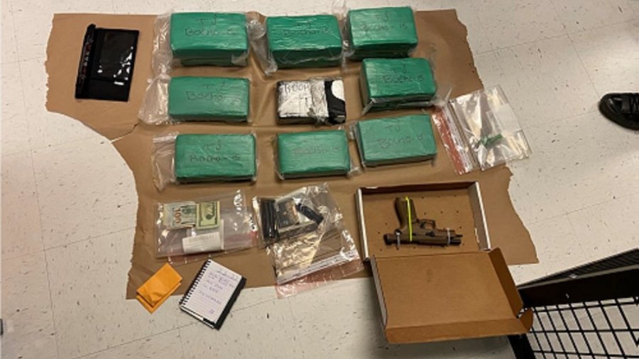 Image: Drugs, guns and money were seized as part of a large investigation led by the DEA and the Se...