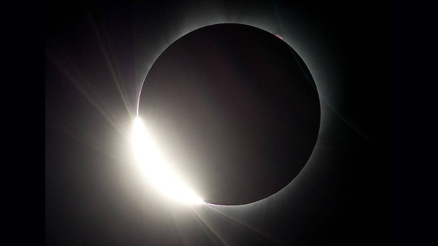 Photo: The moon almost eclipses the sun during a near total solar eclipse as seen from Salem, Ore.,...