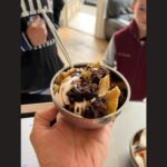 Image: Yogurt with toppings in a bowl is seen at Snohomish's Top It Yogurt Shoppe. 