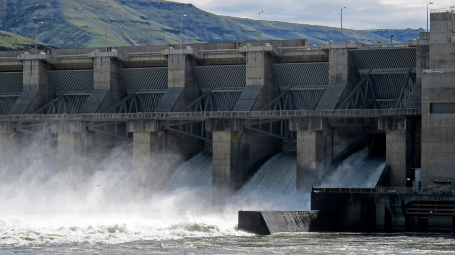 Image: Water moves through a spillway of the Lower Granite Dam on the Snake River near Almota on Ap...