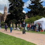 Photo: A person holds an Israel flag while pro-Palestinian people protest at the UW on Monday, April 29, 2024. 