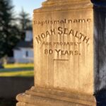 Image: A side view of the monument in Suquamish Memorial Cemetery at the grave of Chief Sealth, namesake of the city of Seattle. Chief Sealth died on June 7, 1866.