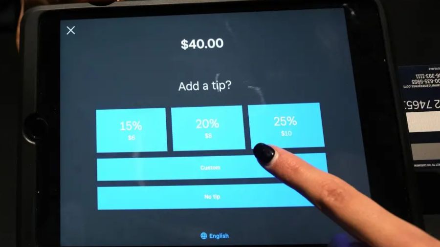 Photo: A tipping option is displayed on a car reader tablet in 2023....