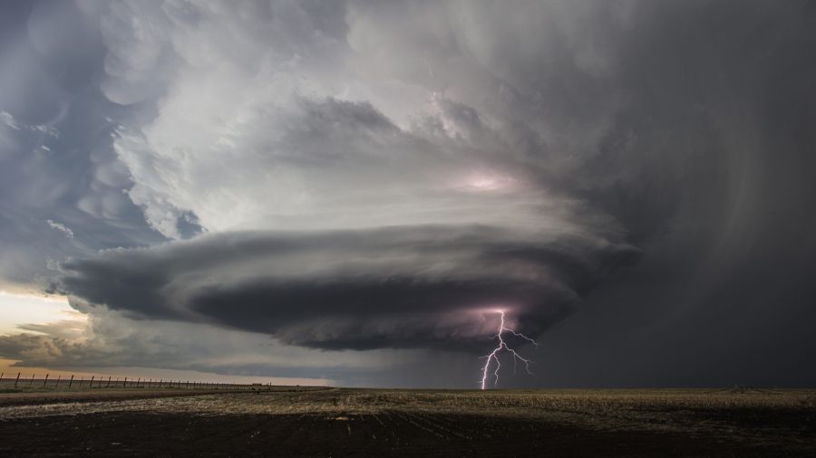 Photo: This May 21, 2020, photo provided by Victor Gensini shows a tornado in Moscow, Kan....