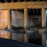 Water spewing from a burst pipe underneath Highway 99 in Seattle’s South Park neighborhood created a river-like stream of water on the road. (Photo: Sam Campbell, KIRO Newsradio)