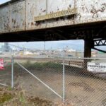 Image: The 1910 railroad bridge and brick-paved road are the only remaining landmarks which have not changed since the Everett Massacre of November 5, 1916.