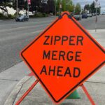 Traffic signs related to zipper merging in Everett. (Photo: Chris Sullivan, KIRO Newsradio)