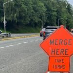 Traffic signs related to zipper merging in Everett. (Photo: Chris Sullivan, KIRO Newsradio)