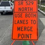 Traffic signs related to zipper merging in Everett. (Photo: Chris Sullivan, KIRO Newsradio)