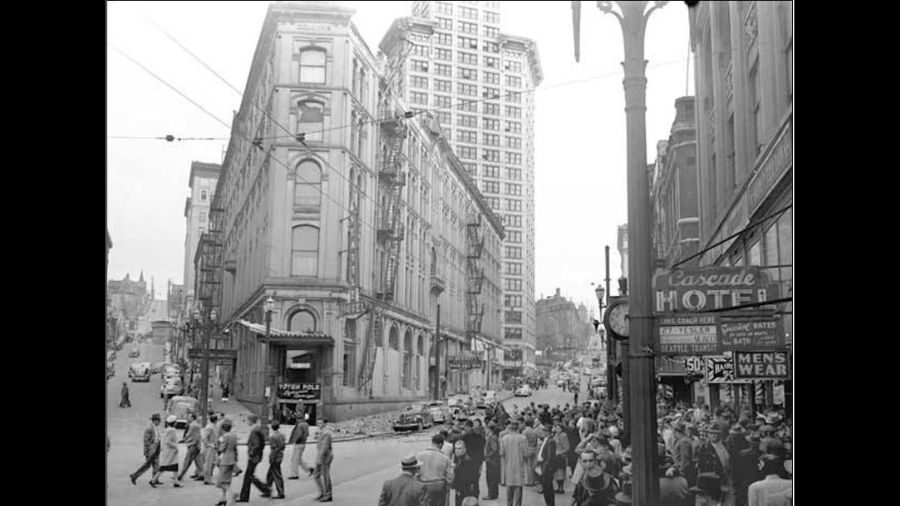 The Seattle Hotel was damaged by the April 13, 1949 earthquake; the steeply tilted parking garage w...