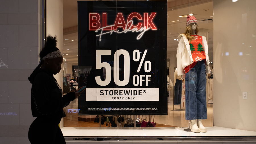 Image: A shopper walks around Twelve Oaks Mall in Novi, Michigan, on Friday, Nov. 24, 2023....